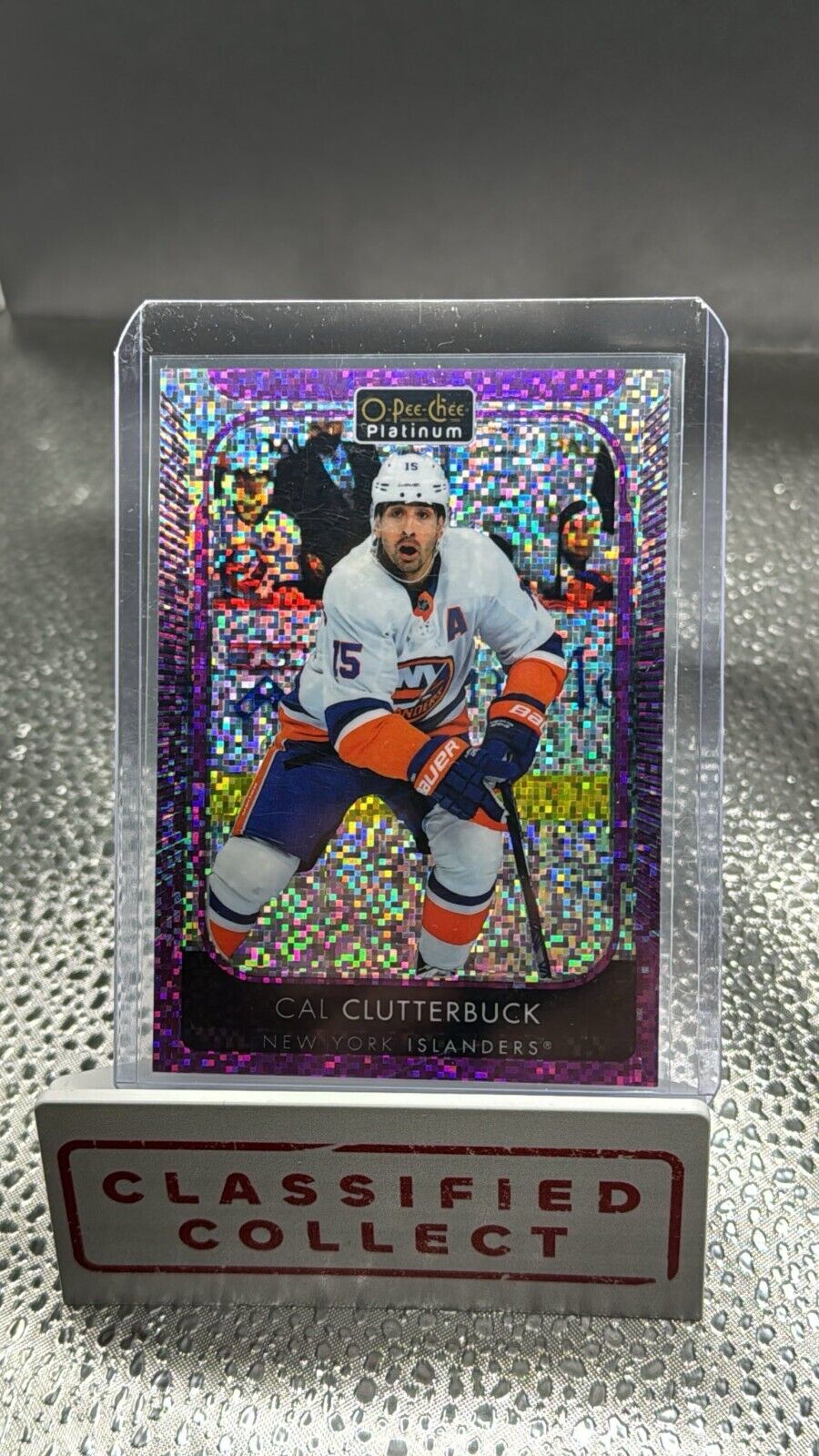 2021-22 O-Pee-Chee Platinum Hockey Cal Clutterbuck Violet Pixels /299